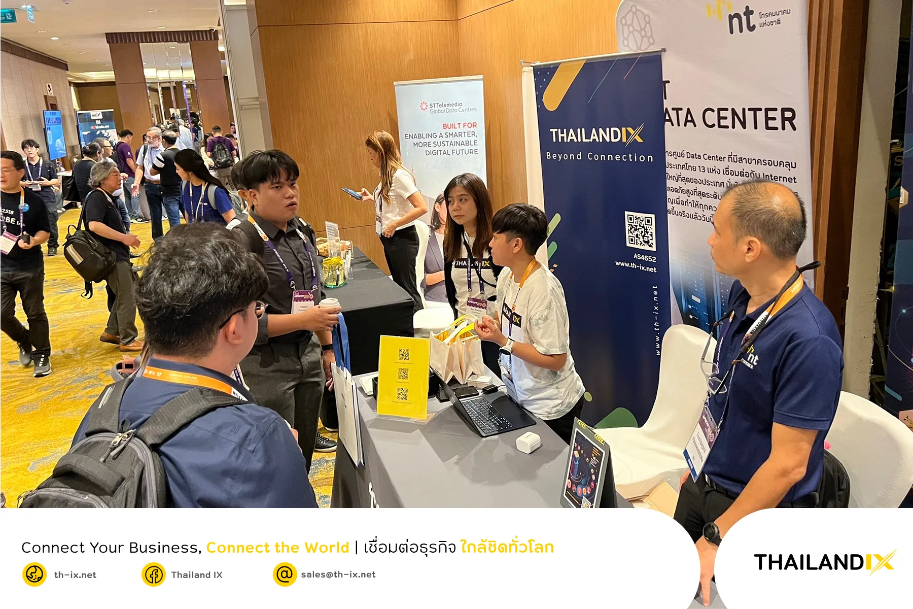 Participants of APRICOT 2024 visiting Thailand IX’s and NT’s booth.